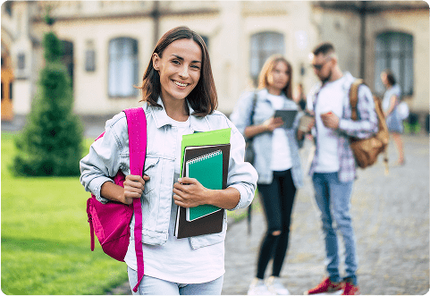 Confident student on global campus ready for international opportunities, academic growth, and career success abroad.