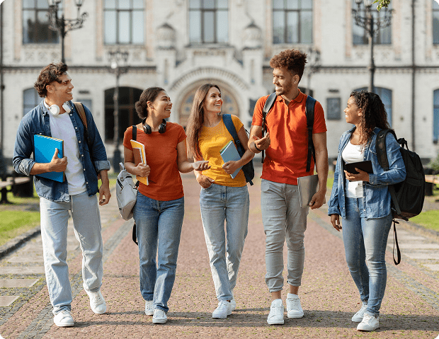 Group of international students walking on a university campus, enjoying their academic journey and preparing for a bright future in Singapore